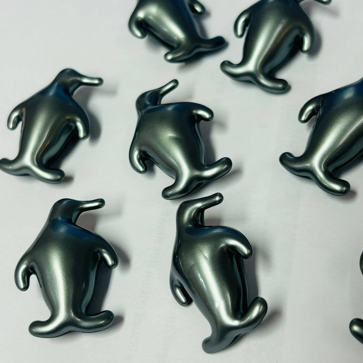 Perles de bain pingouins argentés, parfumés à l'océan